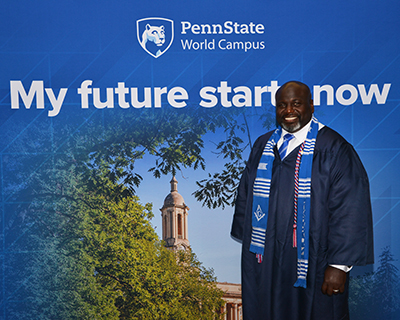 Eddie Brown in front of My future starts now poster