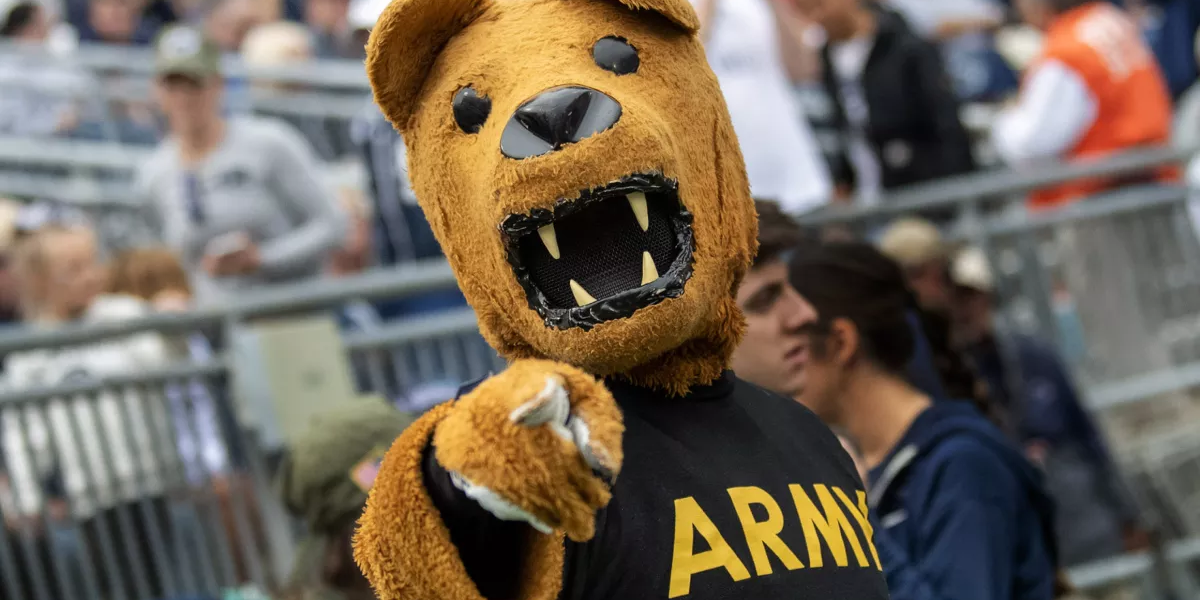 Nittany Lion mascot in Army shirt at Beaver Stadium