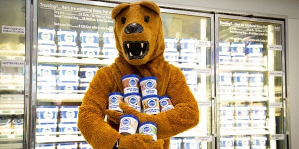 Nittany Lion mascot holding ice cream containers
