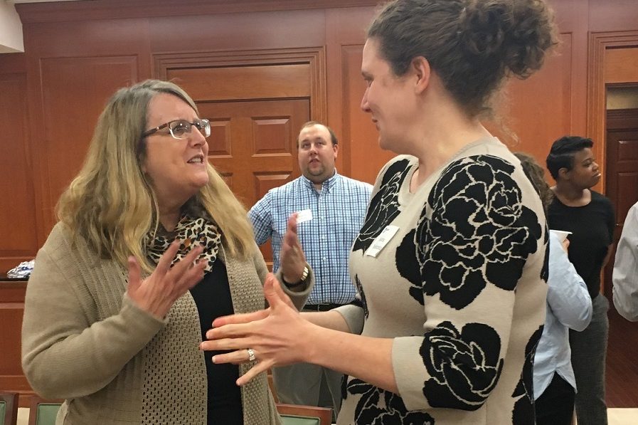 Two women having a discussion at the DC Nittany Networking Event